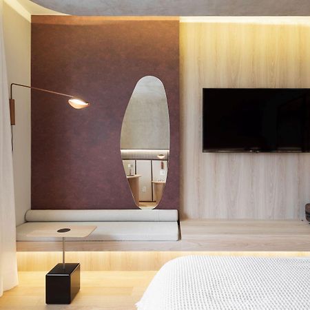Qoya Hotel Curitiba, Curio Collection By Hilton Dış mekan fotoğraf A room at the hotel