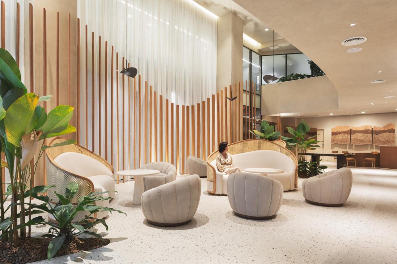 Qoya Hotel Curitiba, Curio Collection By Hilton Dış mekan fotoğraf The interior of the lounge
