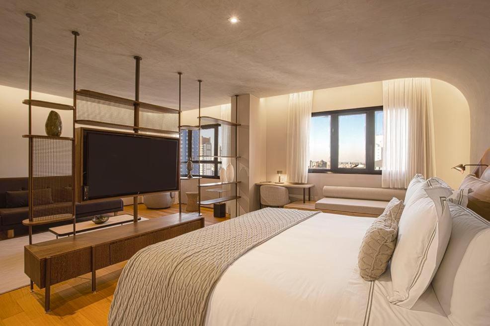 Qoya Hotel Curitiba, Curio Collection By Hilton Dış mekan fotoğraf A room at the hotel